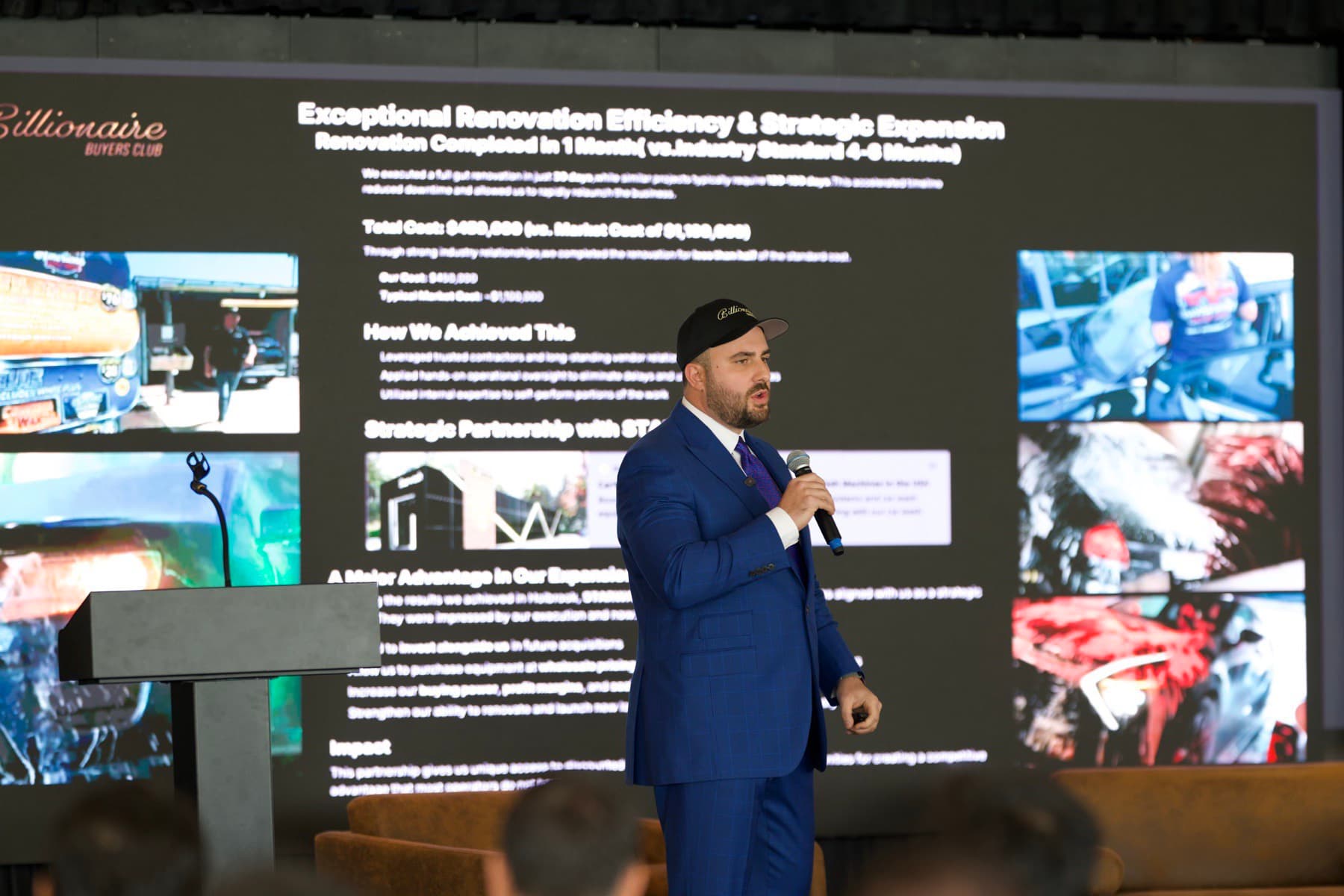 Michael Steinberg presenting a live deal breakdown on stage at a HedgeStone Billionaire Buyers Club event